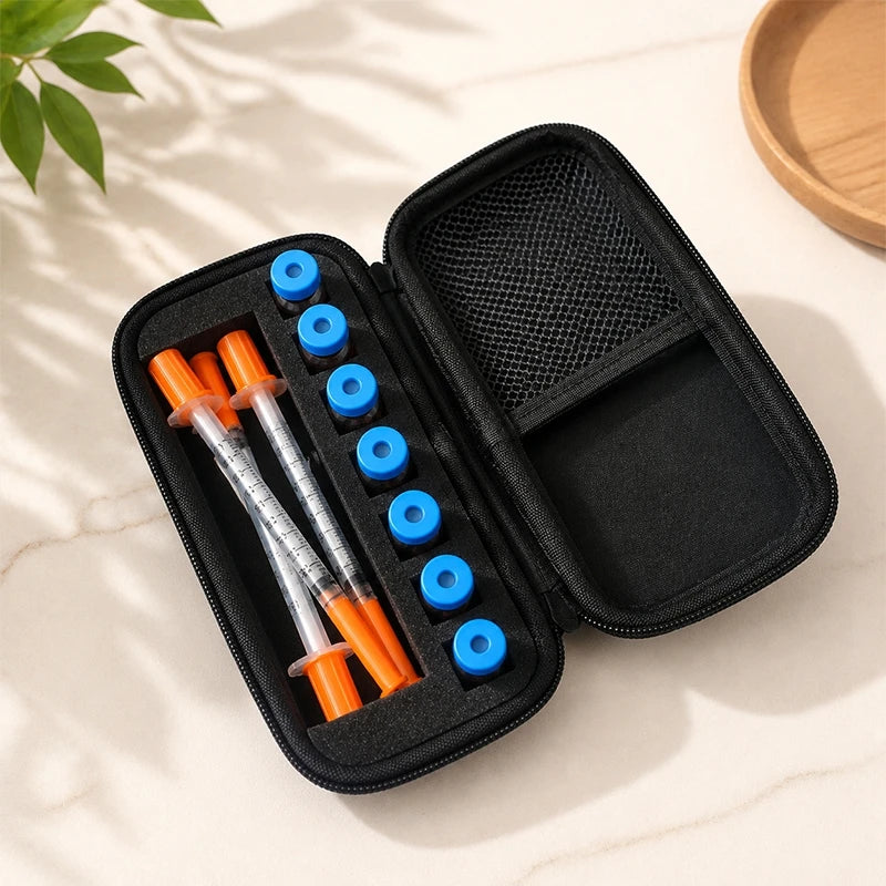 Black portable storage case for insulin and peptide vials with multiple colored tips.