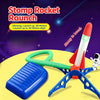 A blue stomp rocket launcher is shown next to a blue foam rocket, demonstrating its launch capability.