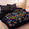 A dark blue duvet cover set featuring a vibrant floral and butterfly print.