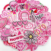 Assorted pink embroidered iron-on patches featuring skulls, flowers, and decorative elements for DIY projects