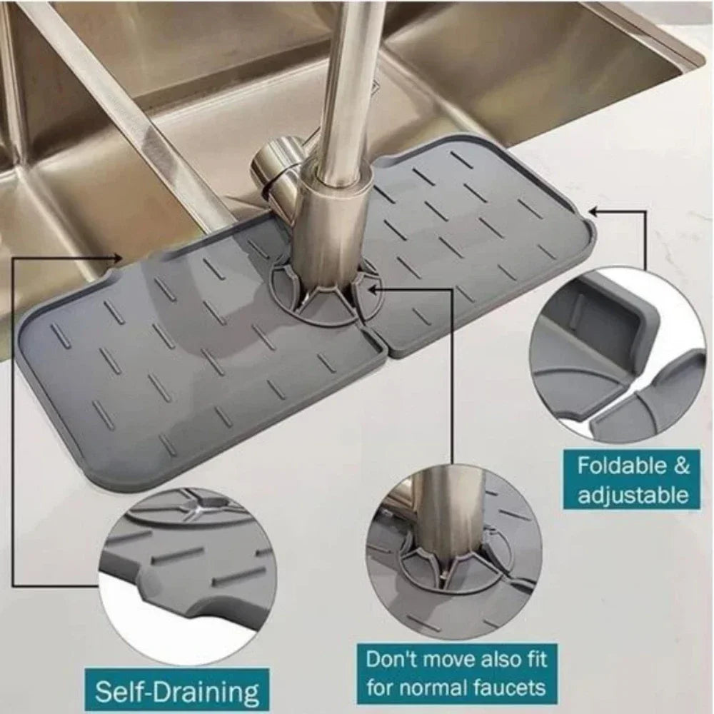 Silicone kitchen sink mat with a faucet splash guard shown in use on a stainless steel sink.