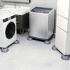 A white washing machine and a silver dryer are shown with anti-vibration pads on their feet in a kitchen setting.