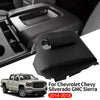 Black center console armrest cover for Chevrolet Silverado and GMC Sierra trucks.