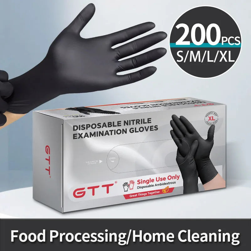 Box of disposable black nitrile examination gloves with a hand wearing them, for food processing or home cleaning.