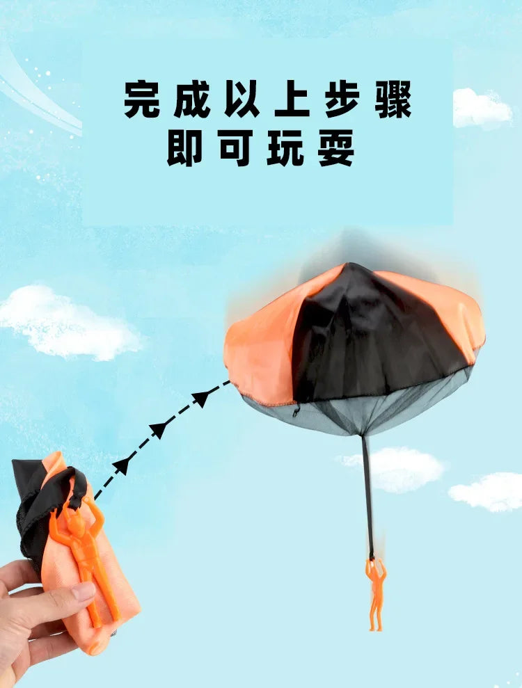 A hand is holding an orange parachute toy with a mini soldier, set against a light blue sky.