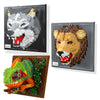 Three framed mosaic wall art kits featuring a wolf, a lion, and a green reptile.