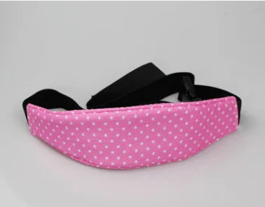 Pink sleeping headrest for a baby car seat with a black belt strap