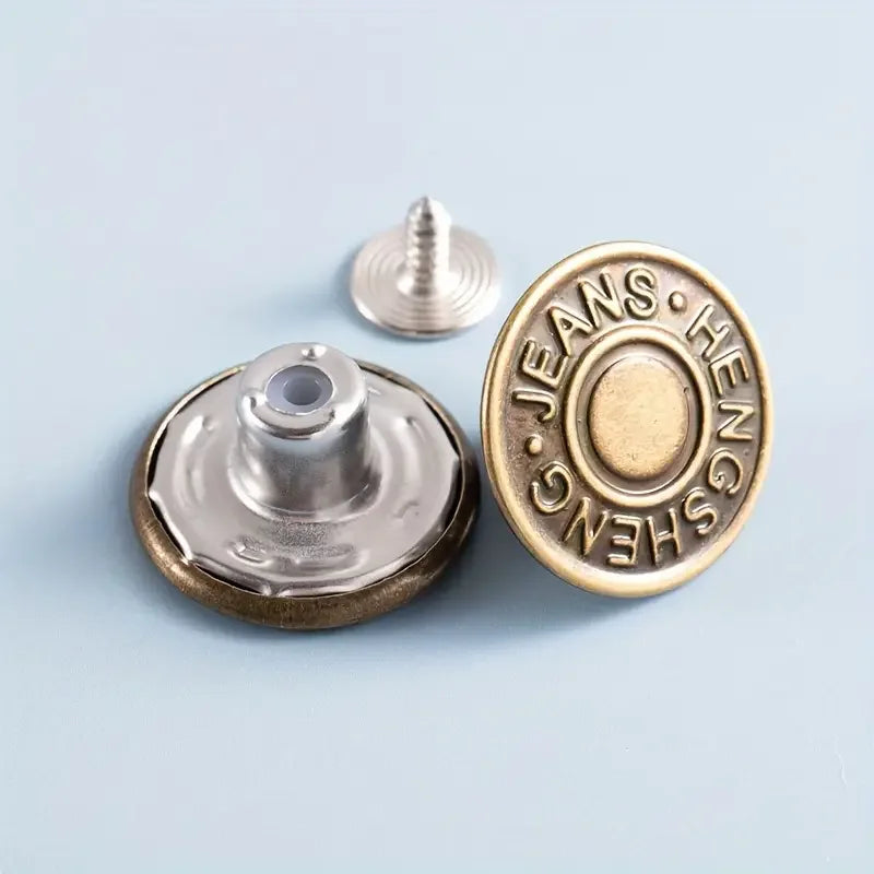A set of bronze buttons shaped like jeans and denim, including a round button and a screw-in button.