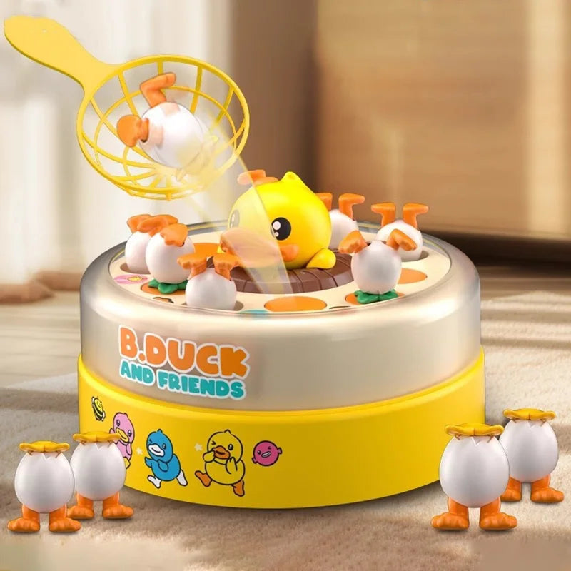 A yellow silicone scoop is shown pouring liquid onto a cake decorated with B.Duck and friends characters.