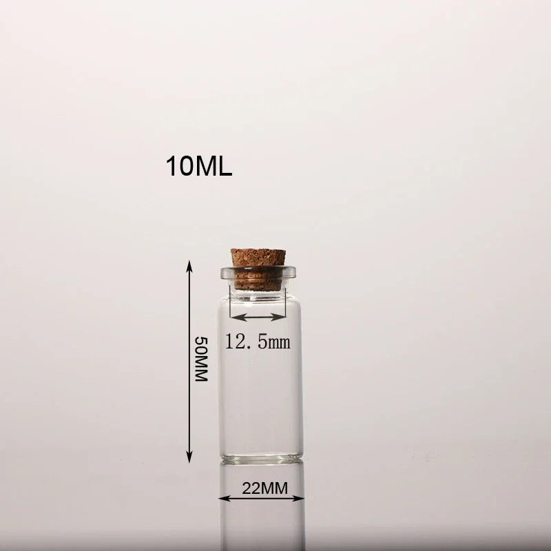 A clear glass bottle with a cork stopper, labeled 10ML and measuring 50MM in height.
