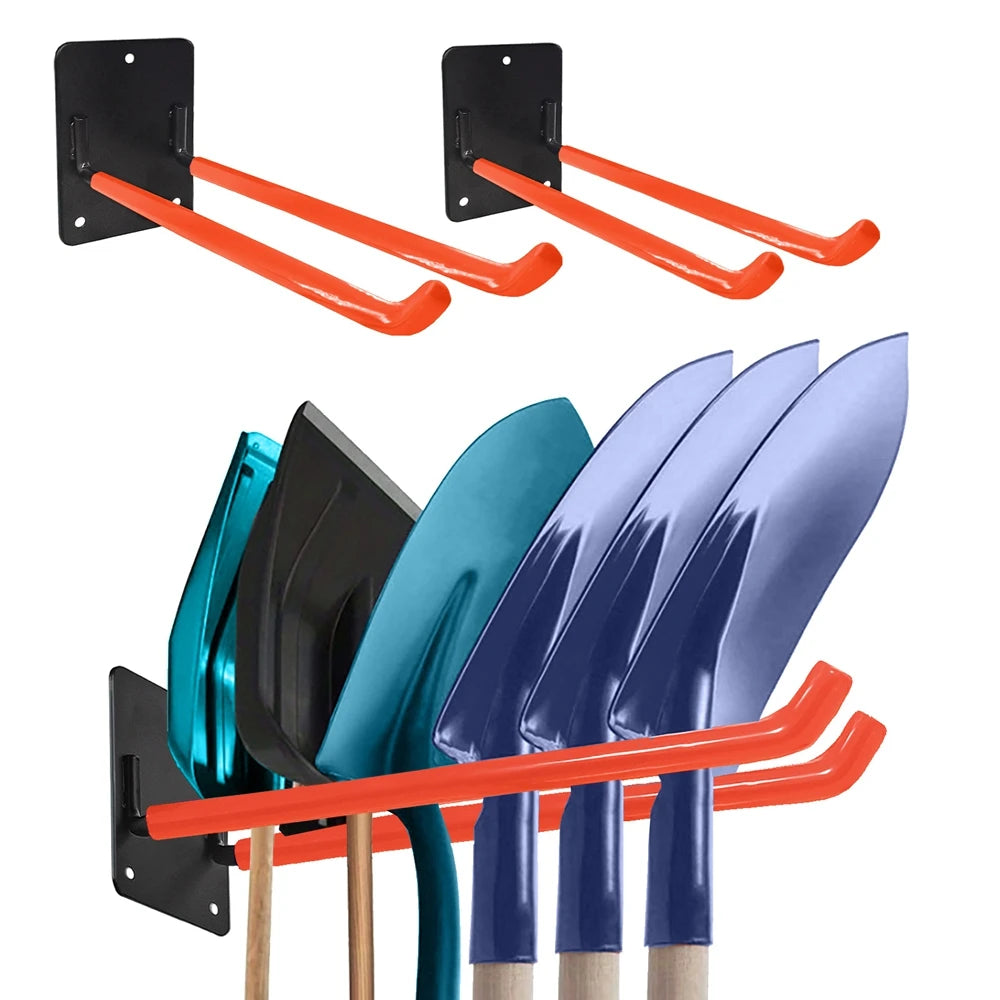 A heavy-duty wall-mounted garden tool organizer rack with black brackets and orange handles, holding several garden tools.
