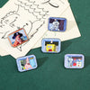 A collection of enamel pins featuring characters from SpongeBob SquarePants and Captain Patrick Star displayed on a green sur