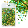 A clear plastic container filled with green and gold holographic star sequins for resin crafts.
