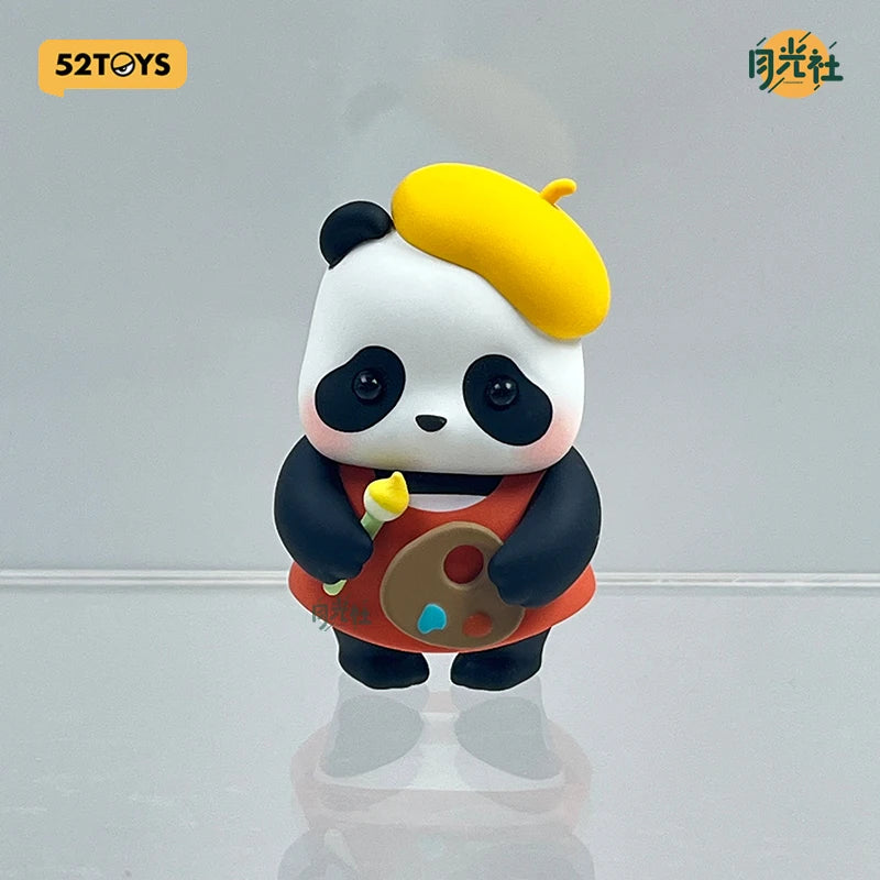 A cute blind box panda figure with black and white fur, yellow ears, and an orange outfit holding a food item.