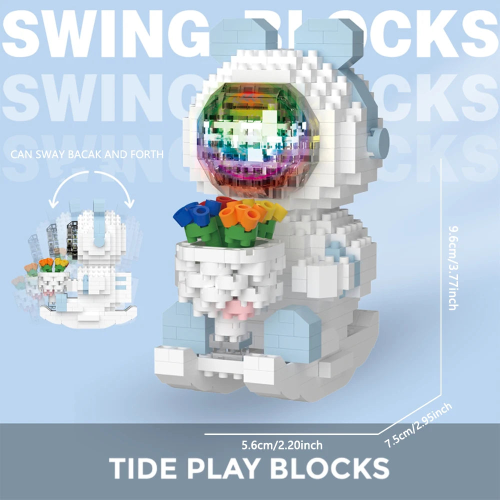 A white astronaut figure made of Tide Play Blocks with a glowing, colorful interior and an LED light.
