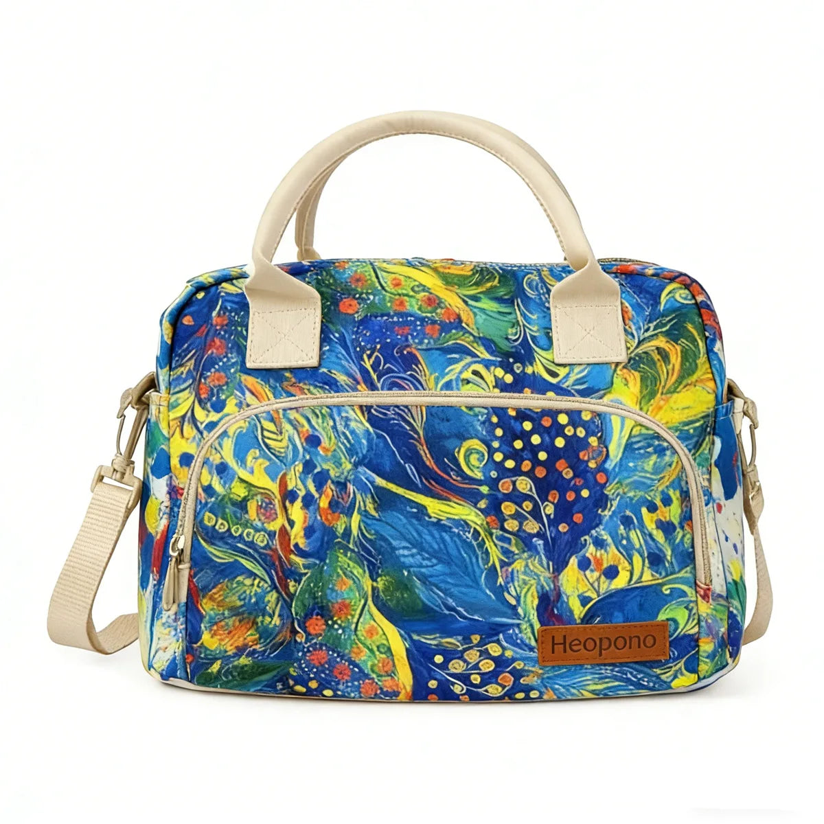 A colorful insulated picnic lunch bag featuring a vibrant blue and yellow tropical pattern with light beige straps.