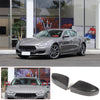 Real carbon fiber side mirror covers for Maserati Ghibli/Quattroporte featuring a dark gray car and replacement mirror covers