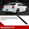 Close-up of a white Chrysler 300 with black rear bumper reflector light covers installed, demonstrating waterproof IP67 prote