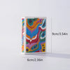 A vertical deck of classic poker playing cards featuring colorful, abstract patterns and the word BALATRO on the side.