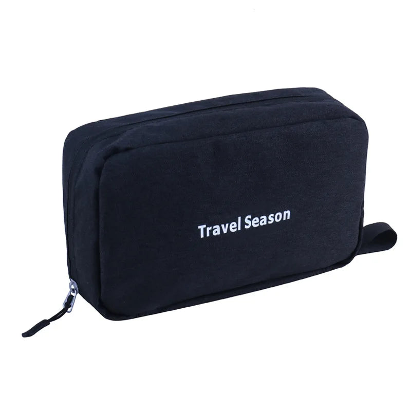 Black hanging travel toiletry bag with the text Travel Season printed on it