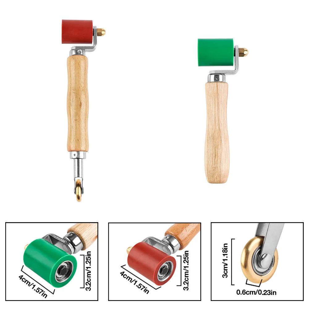 Two silicone seam rollers for welding and waterproofing, one red and one green, with wooden handles.