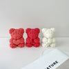 Three pink and white silicone rose bear molds for crafting candles, soap, and resin