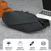 Black minimalist waterproof running waist pack shown on a gray surface with feature icons.