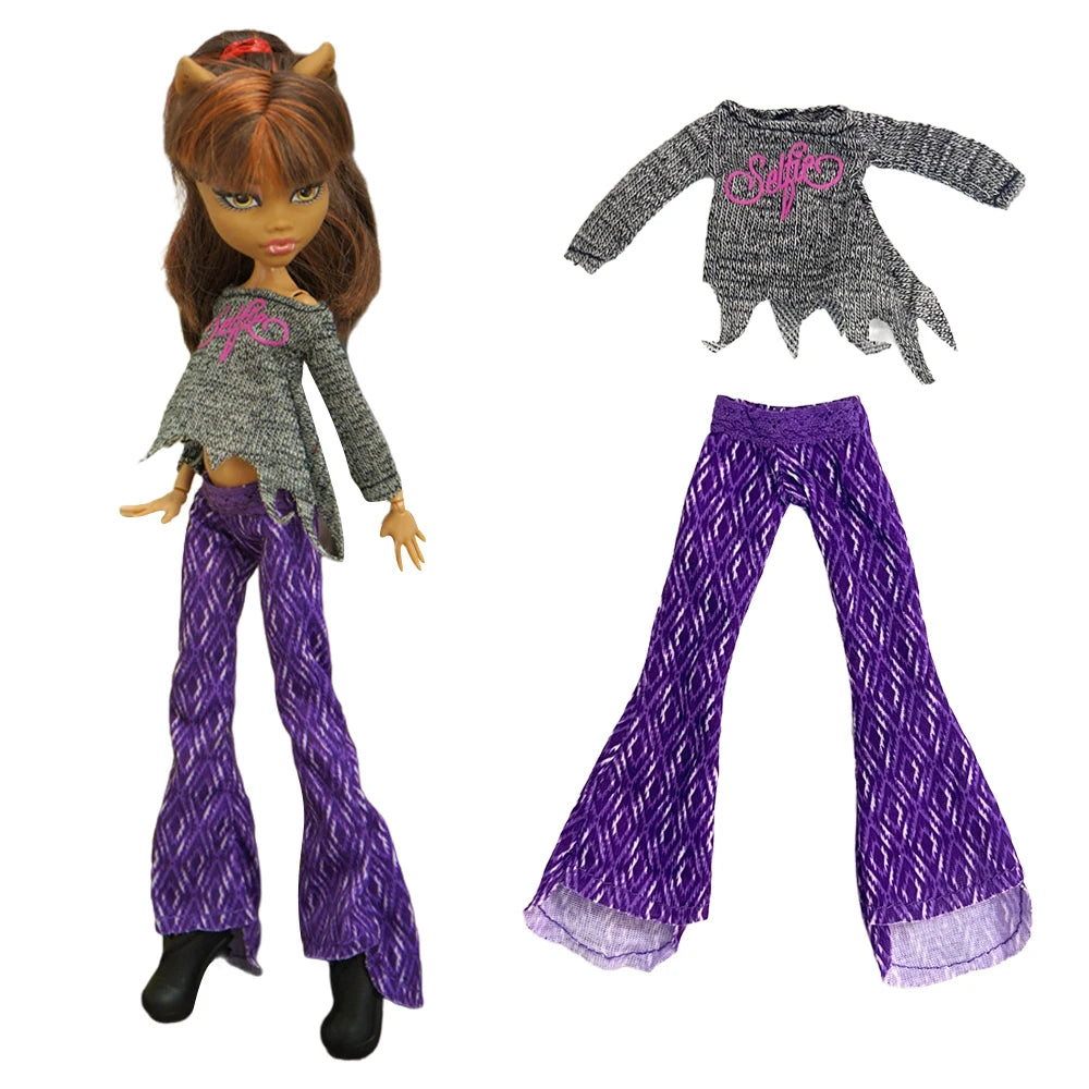A fashion doll outfit featuring a gray top and purple pants with a sparkly design.