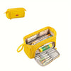 A yellow double-deck canvas pencil case is shown, open to reveal various writing instruments and supplies.