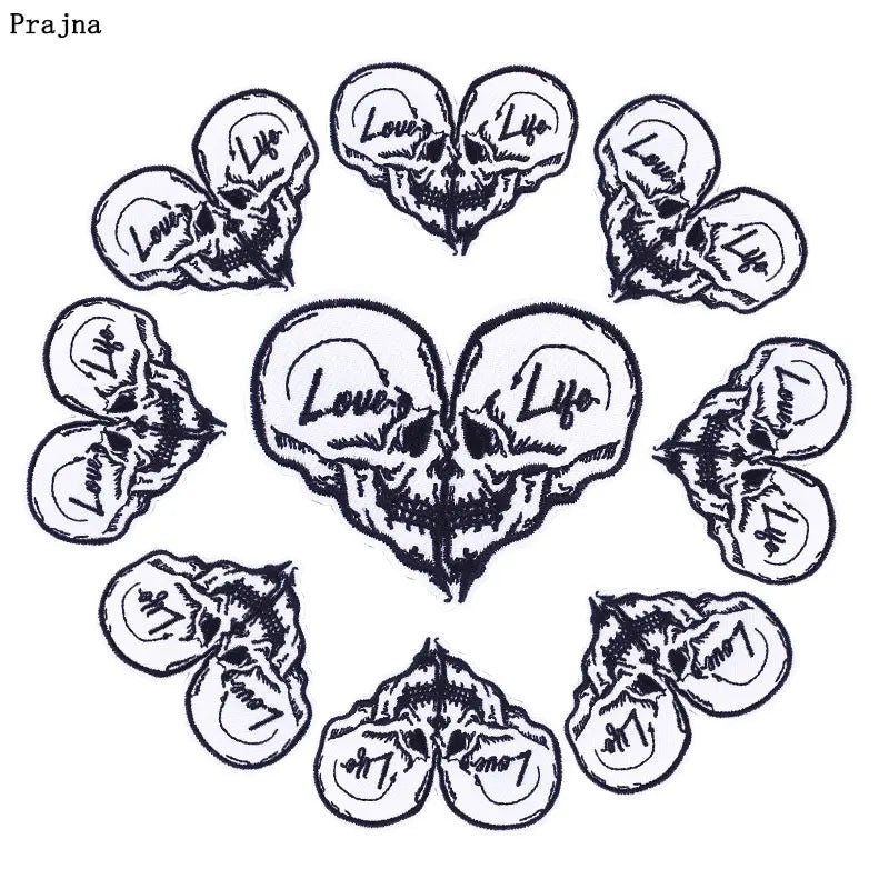 A collection of ten rock skull embroidered iron-on patches designed for clothing and accessories.