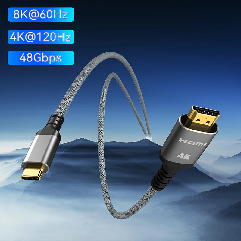 A silver USB-C to HDMI cable is shown against a mountainous backdrop, highlighting its 8K/60Hz and 4K/120Hz capabilities.