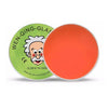 A round orange putty in a green tin featuring a cartoon man and text that reads Glow in the Dark