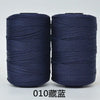 Two spools of dark blue 3-ply polyester knitting yarn for crochet and hand crafts