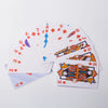 A fan of classic poker playing cards showing a spread of cards from 2 through King.