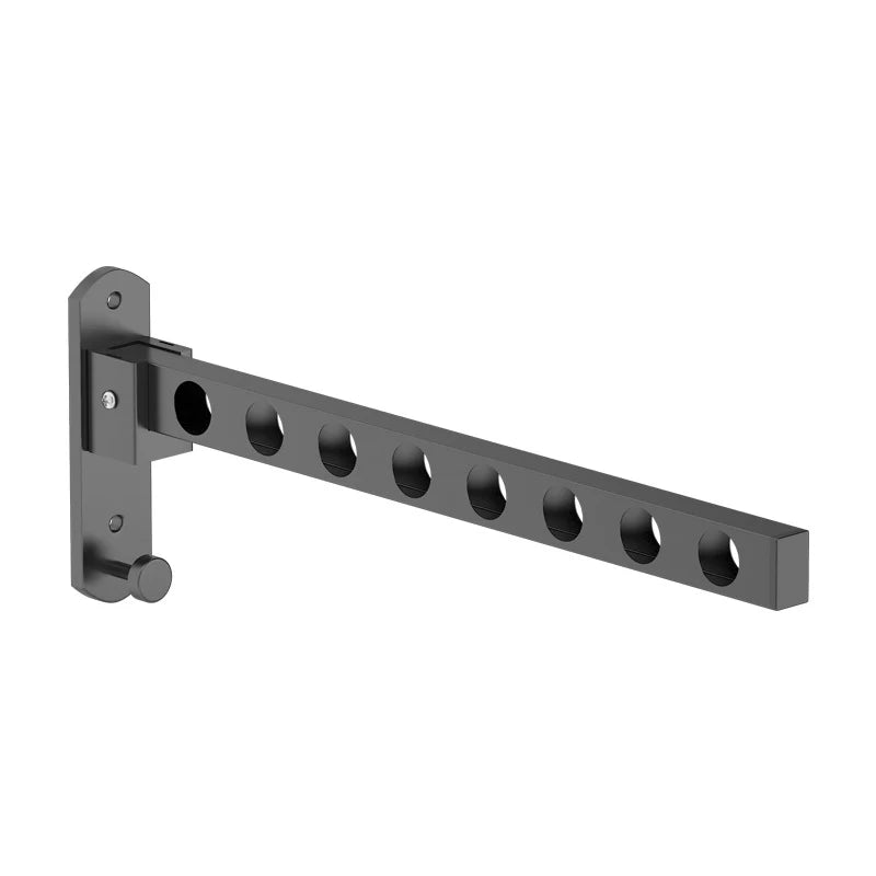 A black foldable wall-mounted clothes drying rack with multiple holes for hanging items.