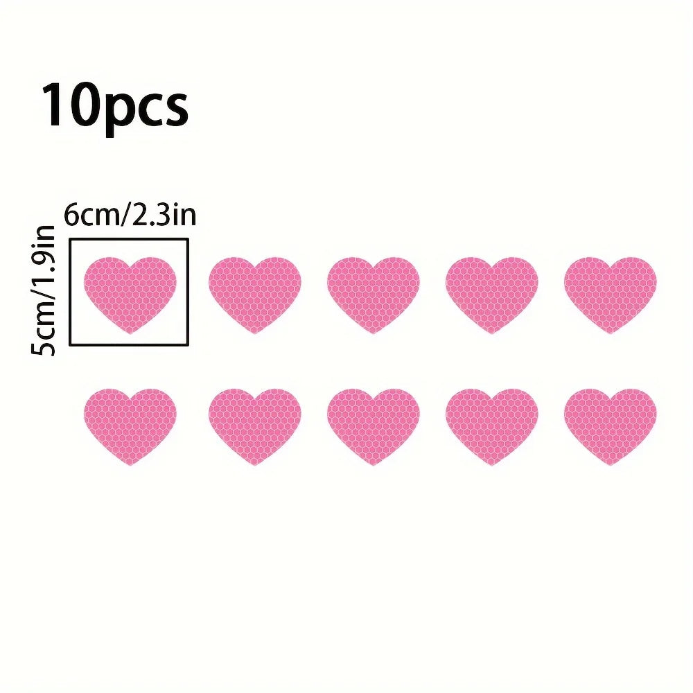 Ten pink heart-shaped stickers for night safety and car decoration, measuring 6cm/2.3in.