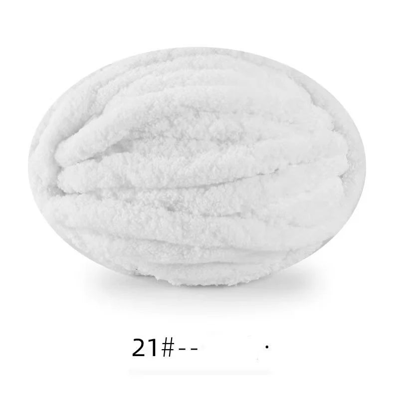 A ball of white extra thick chenille yarn for hand knitting