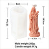 A pink silicone mold shaped like a religious figure for candle and resin crafting.