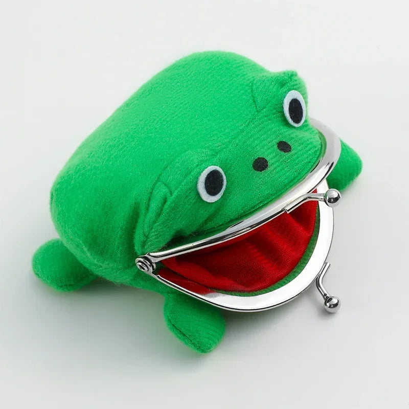 A green plush frog coin purse with a silver mouth opening and a small keychain.