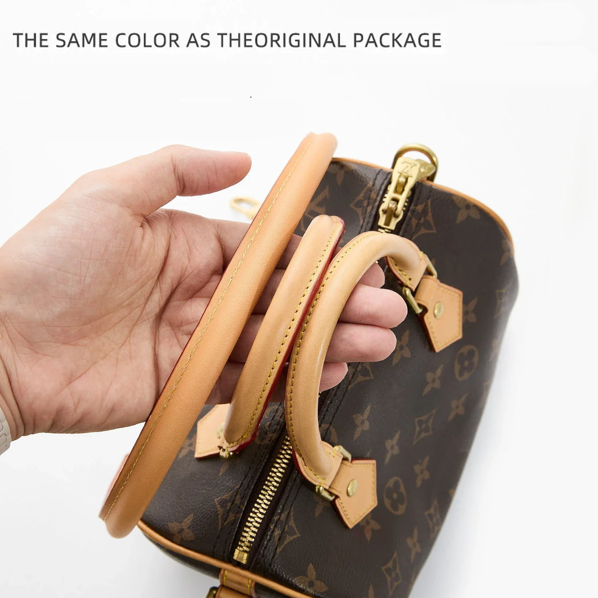 A hand holds a dark brown synthetic leather handbag with a tan strap, showing the color matches the original package.