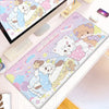 A pink and white kawaii cartoon gaming desk mat featuring cute cats and characters with a non-slip rubber base.
