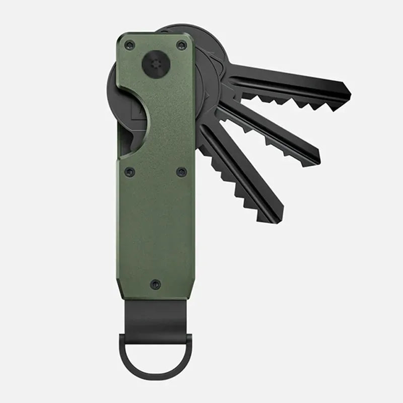 A minimalist aluminum key organizer in olive green holds several metal keys.
