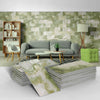 A stack of marble self-adhesive wall stickers in various shades of green and beige on a white surface.
