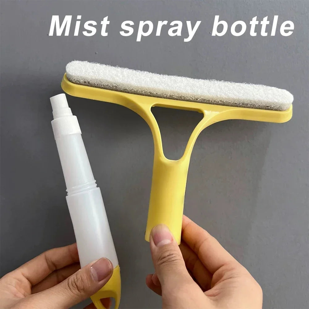A yellow mist spray bottle with a white sponge applicator is being held by a hand against a gray background.
