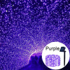Purple fairy string lights illuminating a tunnel or pathway at night