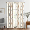 Light filtering window panels featuring a boho tribal bull skull print in beige and white patterns.
