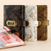 A set of three brown and beige lockable organizer notebooks featuring cartoon bear designs.