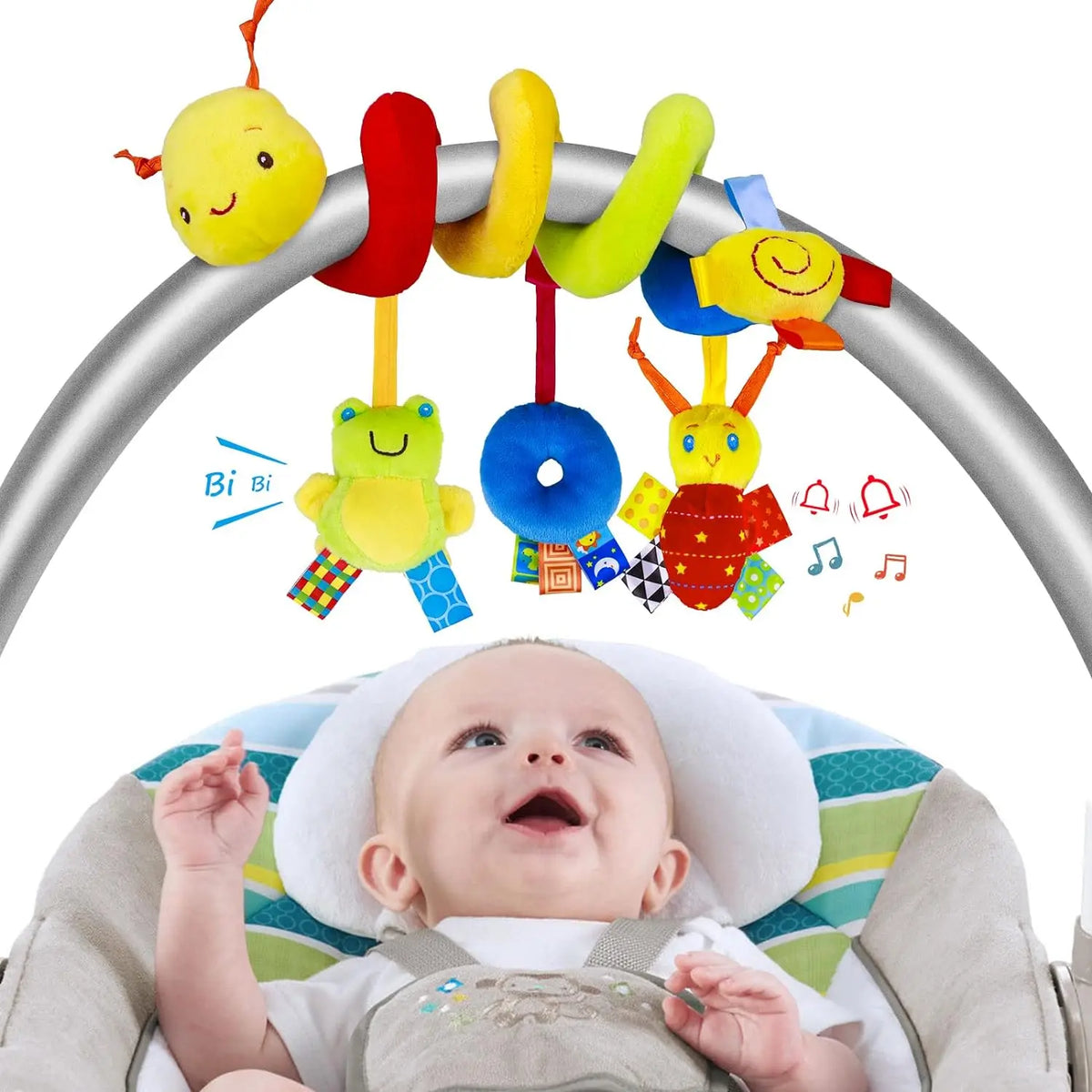 A plush spiral crib and stroller activity toy with hanging rattles is shown above a baby.