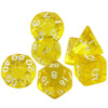 A set of seven transparent yellow polyhedral dice used for tabletop role-playing games