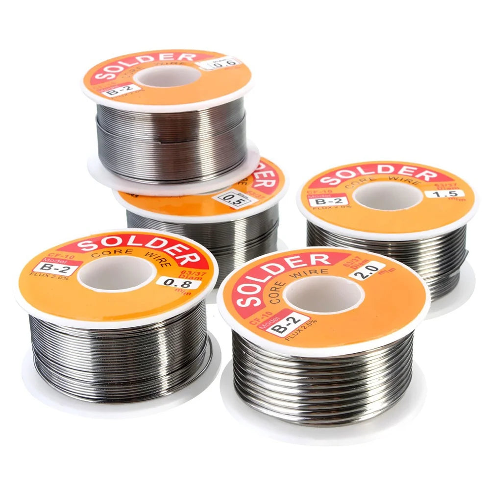Several spools of solder core wire in various sizes and thicknesses are displayed on a white background.